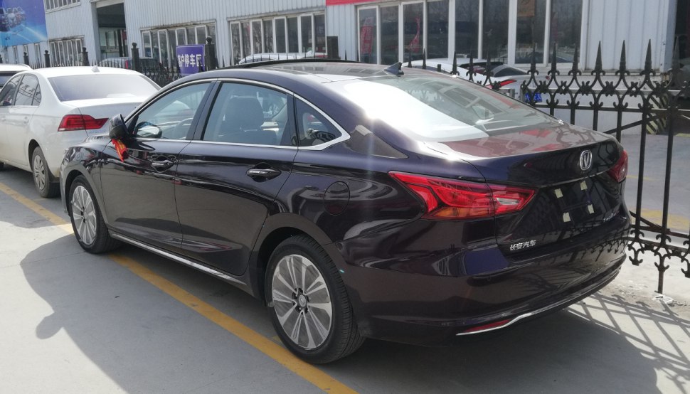 rear and side profile of sleek sedan with modern taillights