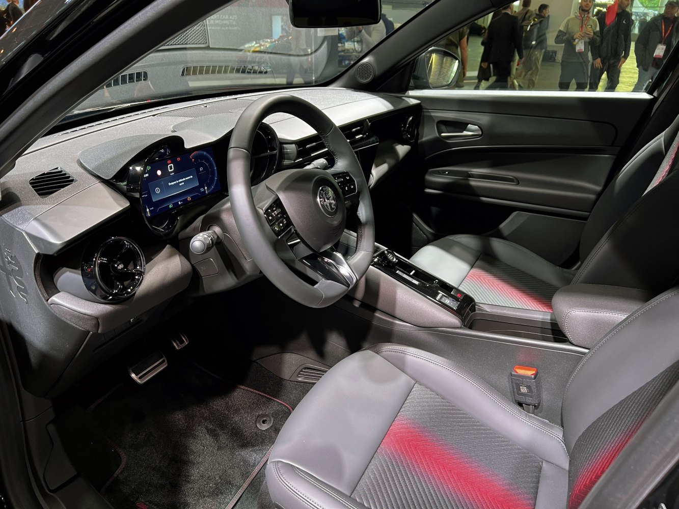 Digital dashboard and sporty steering wheel with modern interior details