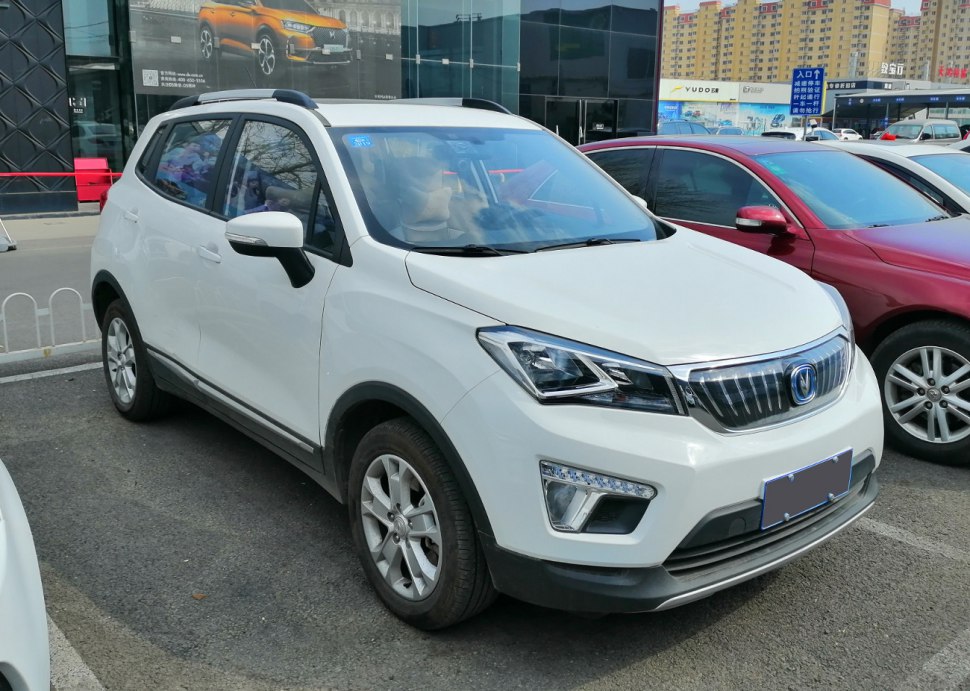 Compact SUV front-side view with modern headlights and grille