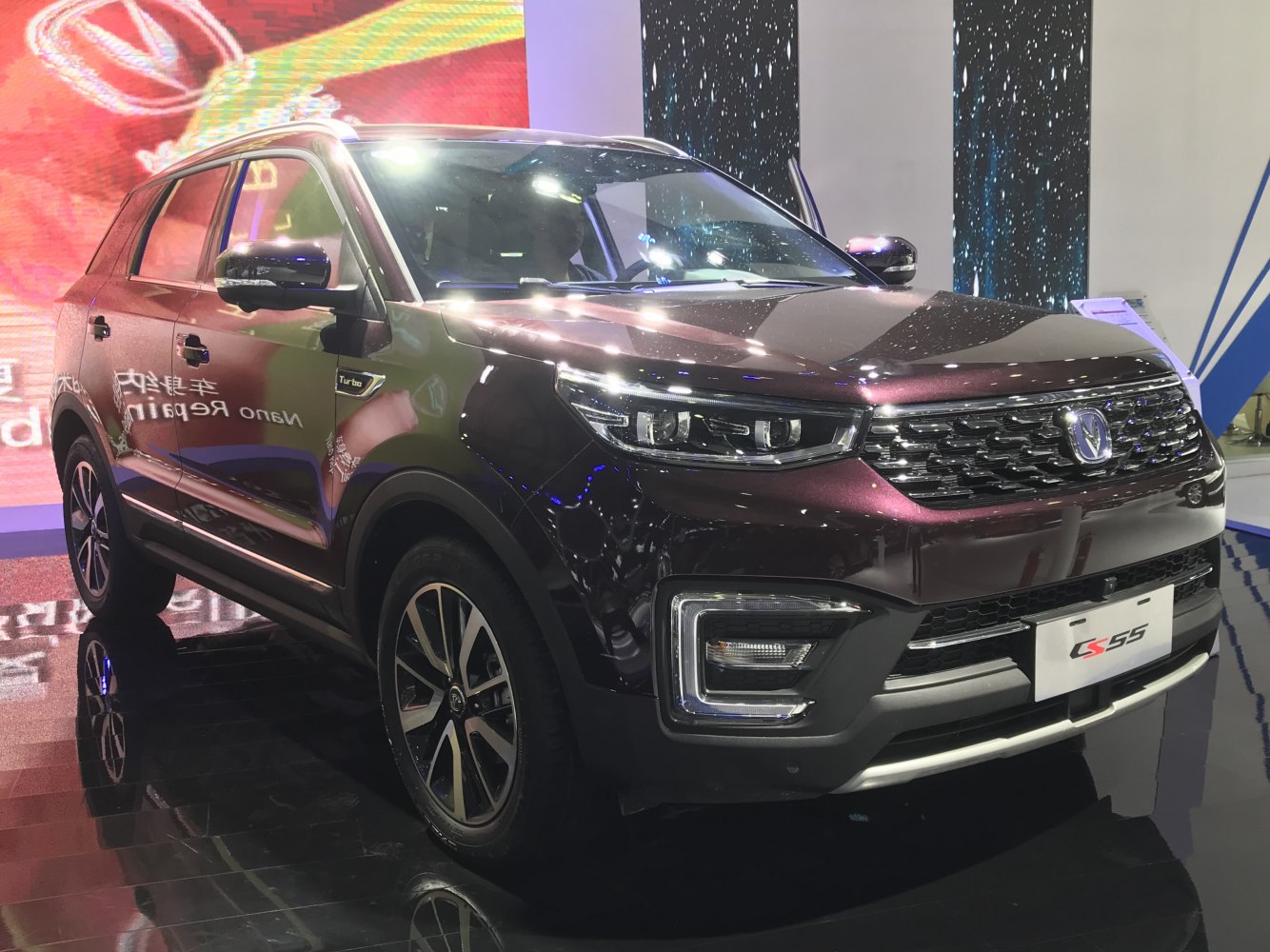 Front and side view of SUV with LED headlights and distinctive grille