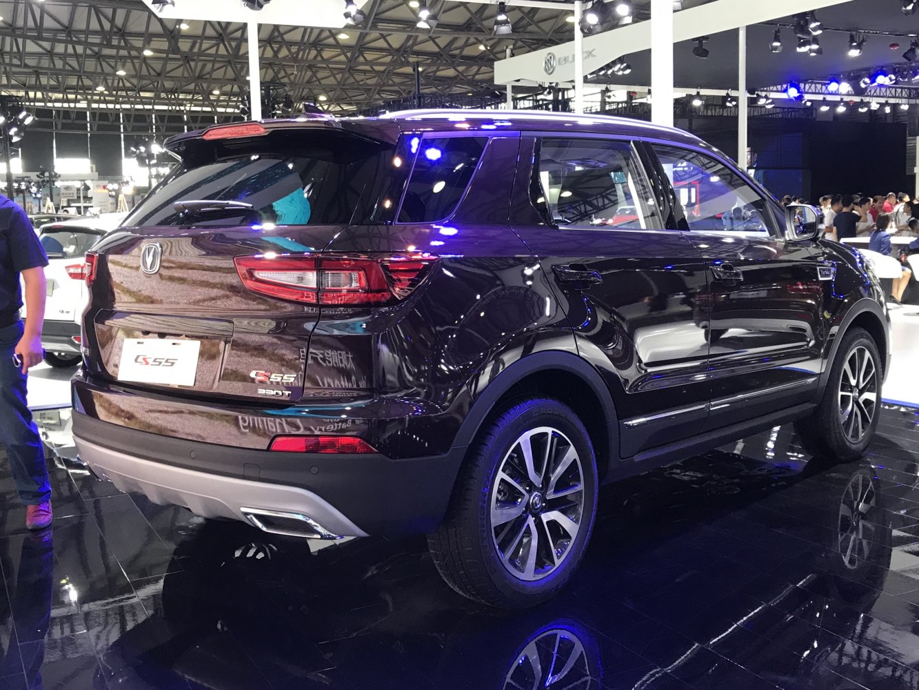 Rear and side profile of a sleek SUV with alloy wheels and modern taillights
