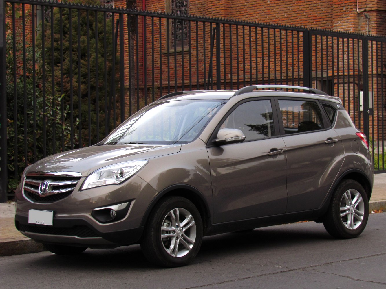 Compact crossover SUV with roof rails and alloy wheels
