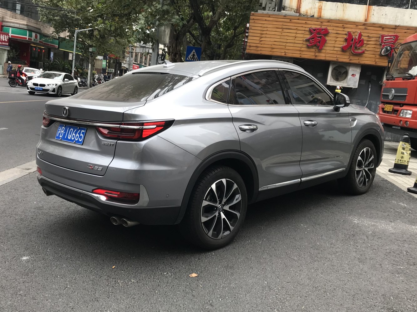 Sleek rear with LED taillights and dual exhaust pipe design.