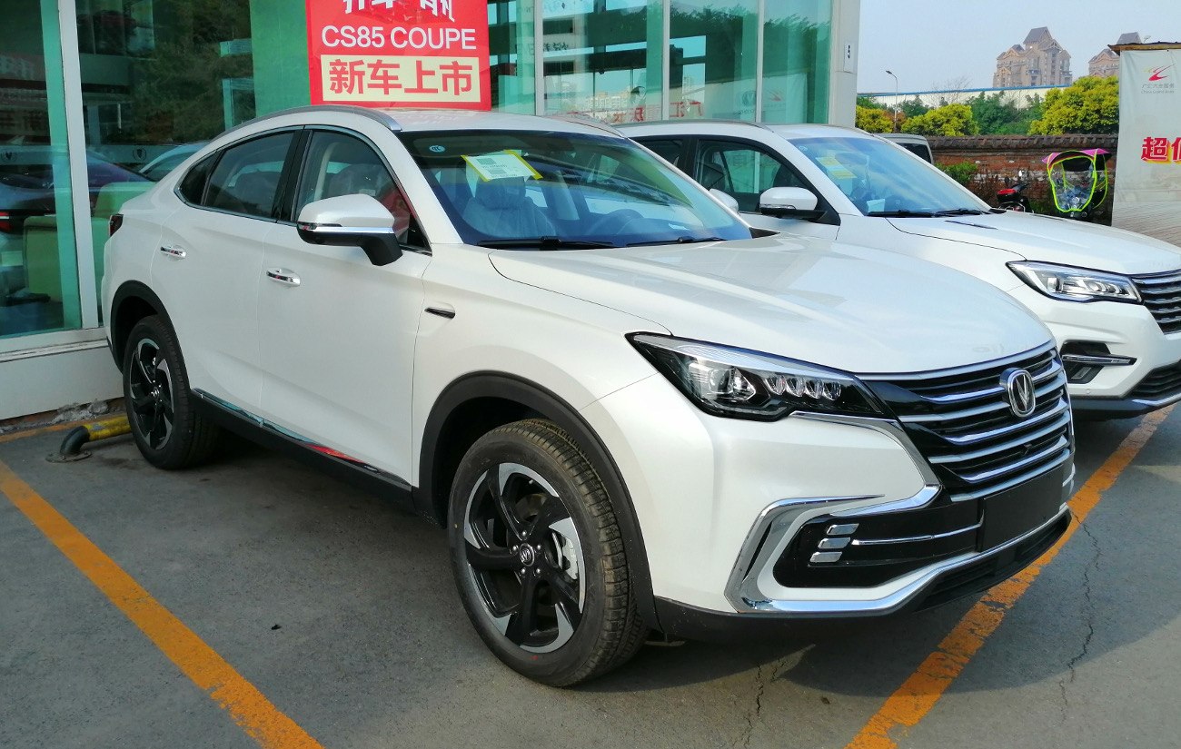 Front-side view of SUV coupe with LED headlights and alloy wheels