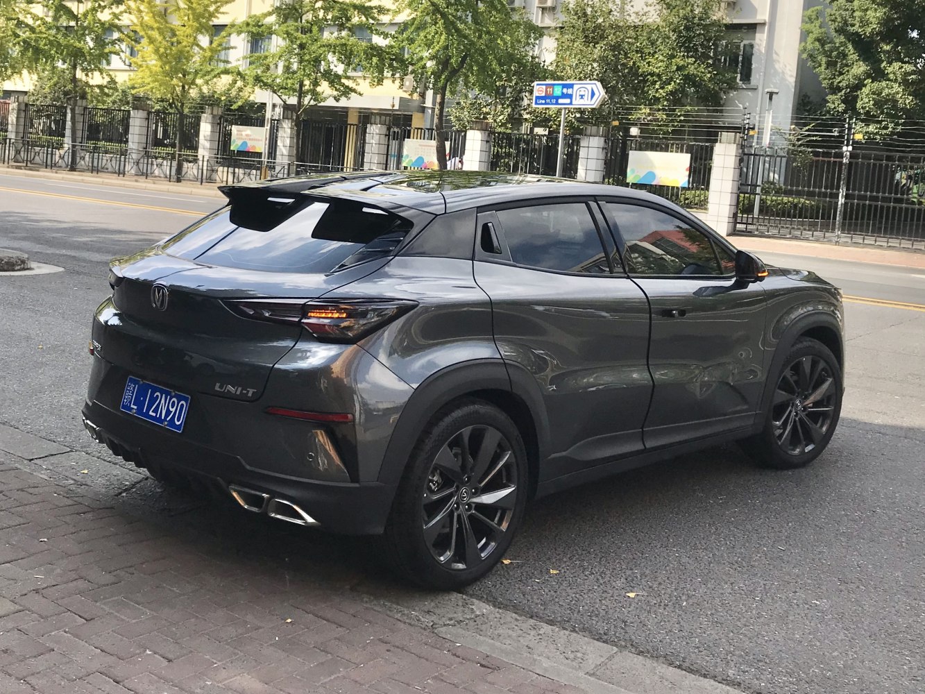 Sporty SUV rear with sleek taillights and dual exhaust pipes
