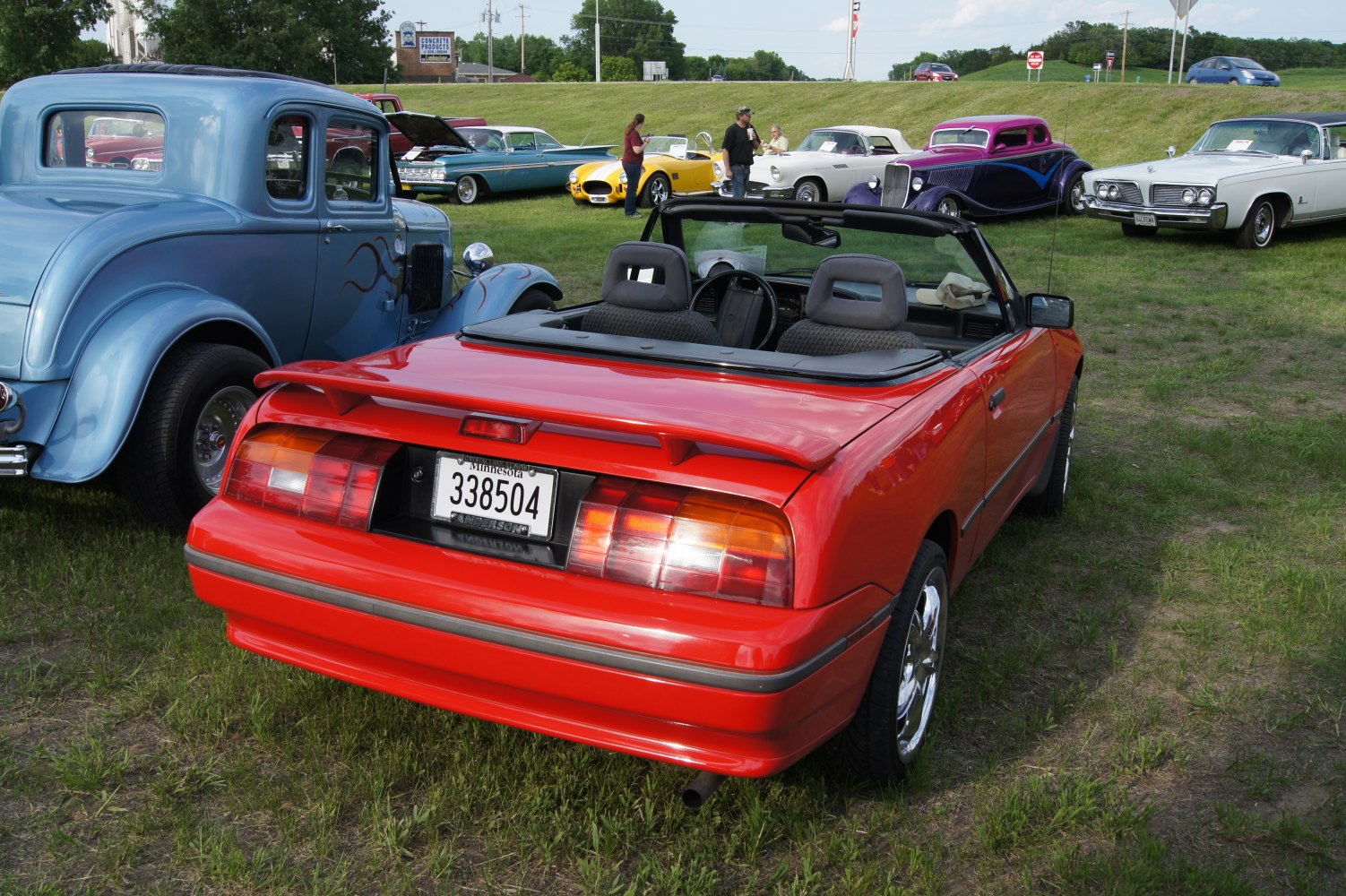 Red convertible rear with spoiler and tail lights