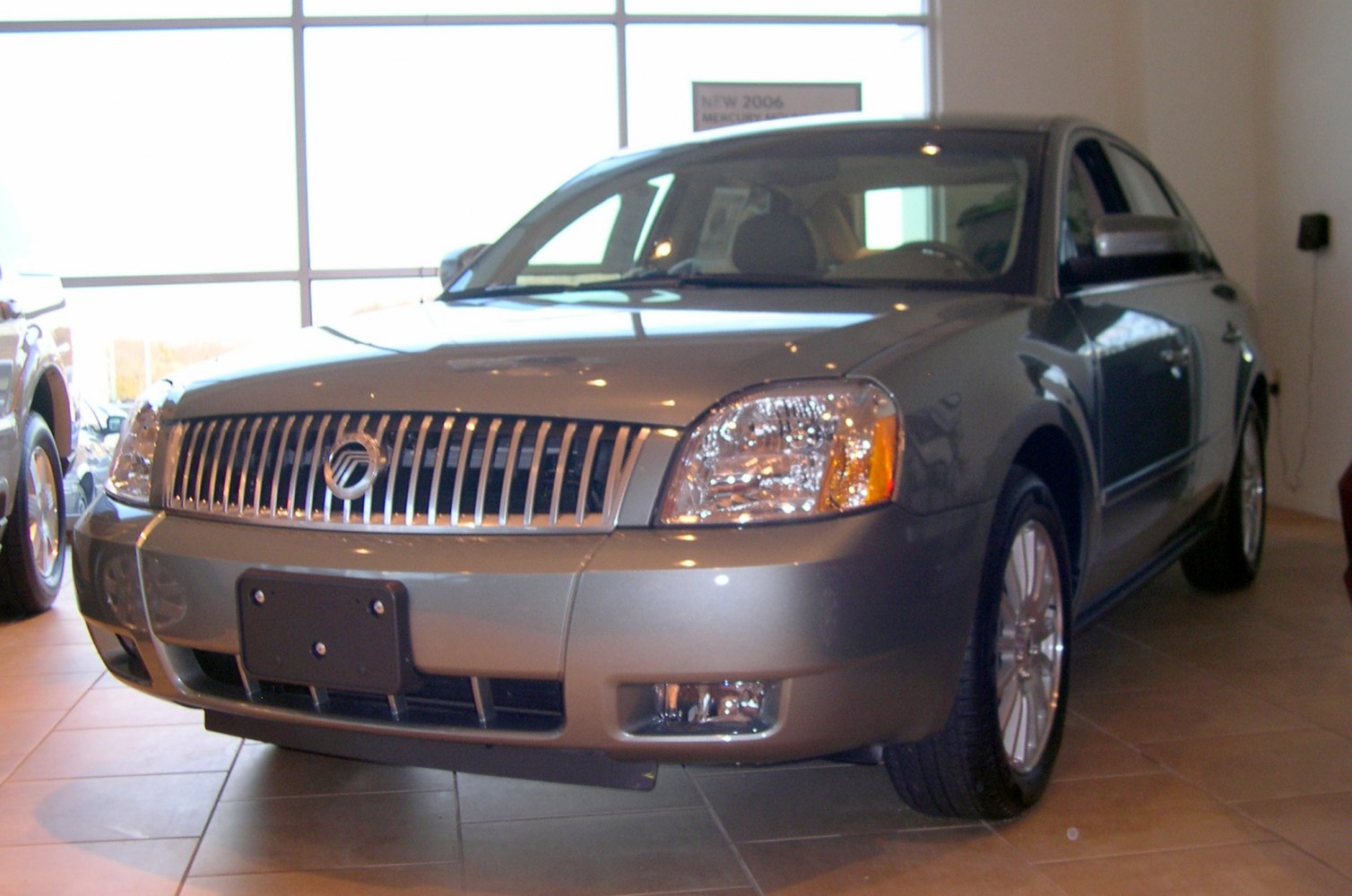 Vertical slat grille and clear headlights front view