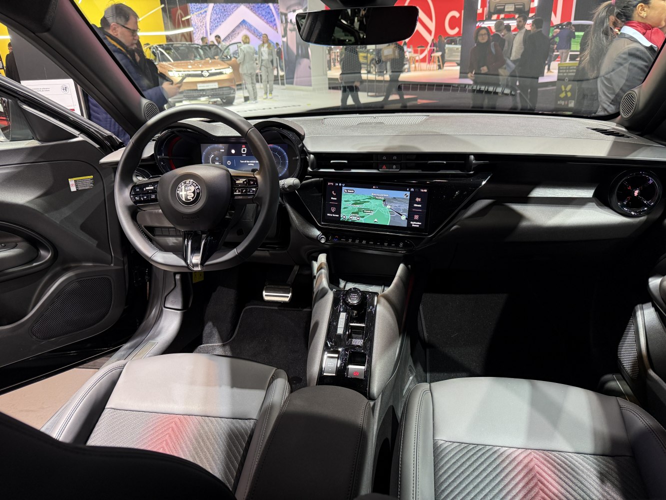 Digital dashboard and central touchscreen display with premium seating
