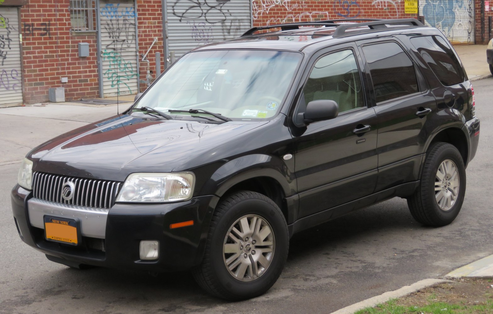 Black SUV front side view, classic rugged urban style