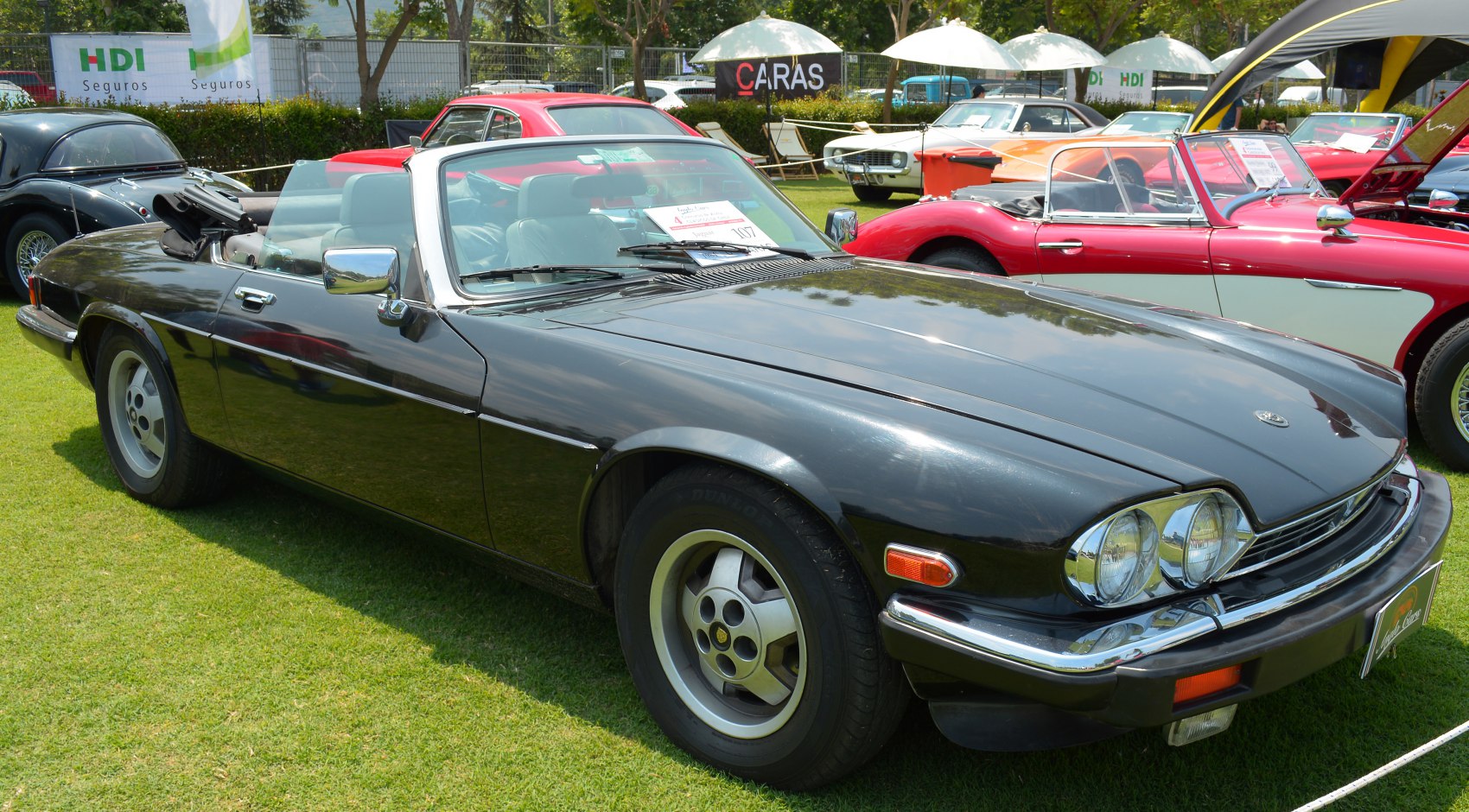 Classic convertible with round headlights and open-top design