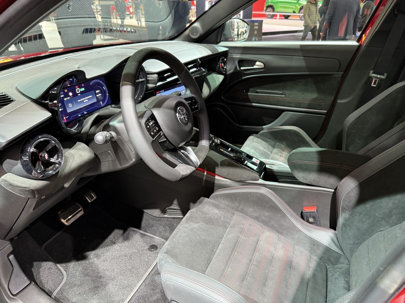 Digital instrument cluster and premium sport seats in modern car interior
