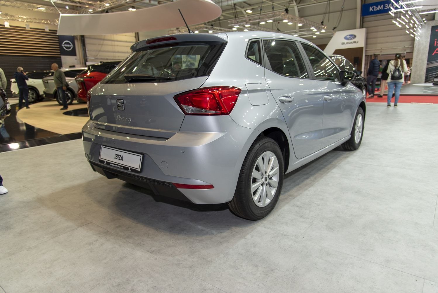 Silver five-door hatchback rear with distinctive taillights