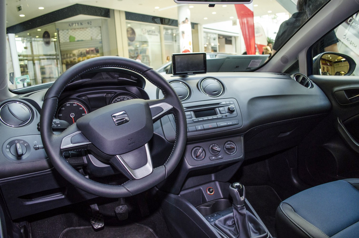 Steering wheel, dashboard, and center console with manual gearshift