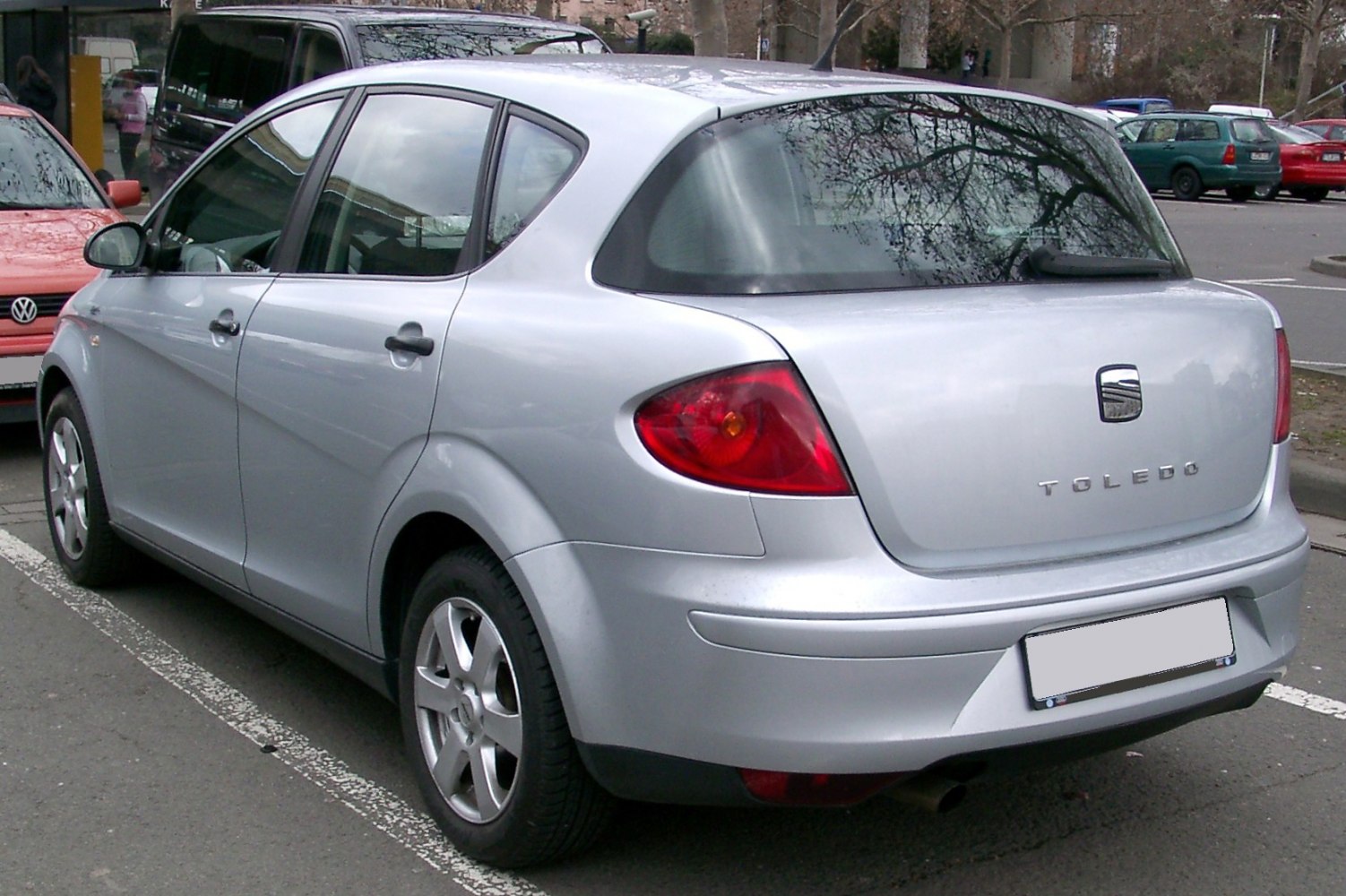 Silver hatchback rear and side view with rounded tail lights