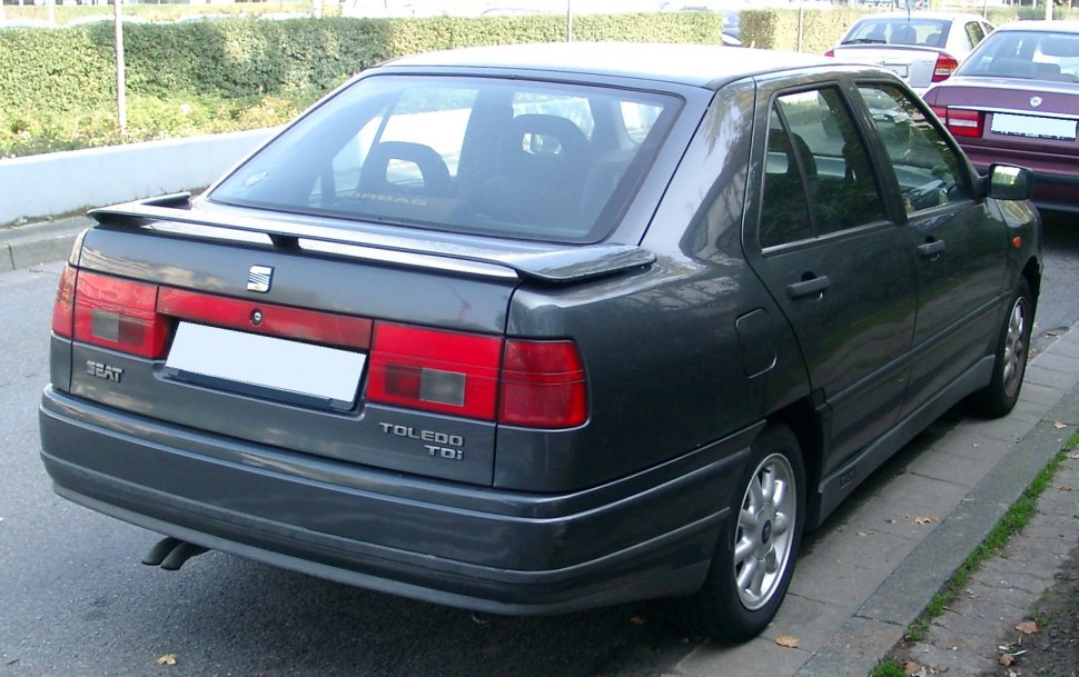 Rear view of sedan with TDI badge and rear spoiler