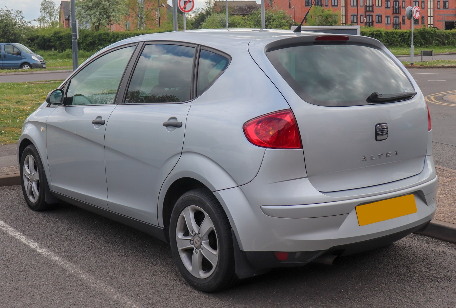 Rear and side view of compact hatchback with distinctive taillights