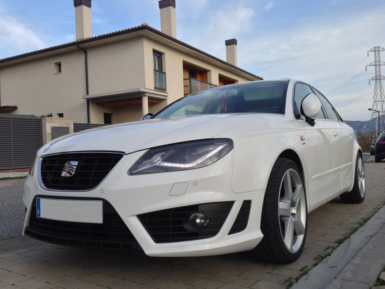 Front view with LED headlights and sporty grille