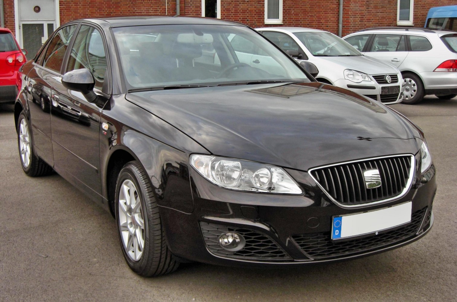 Black sedan with distinctive front grille and clear headlights
