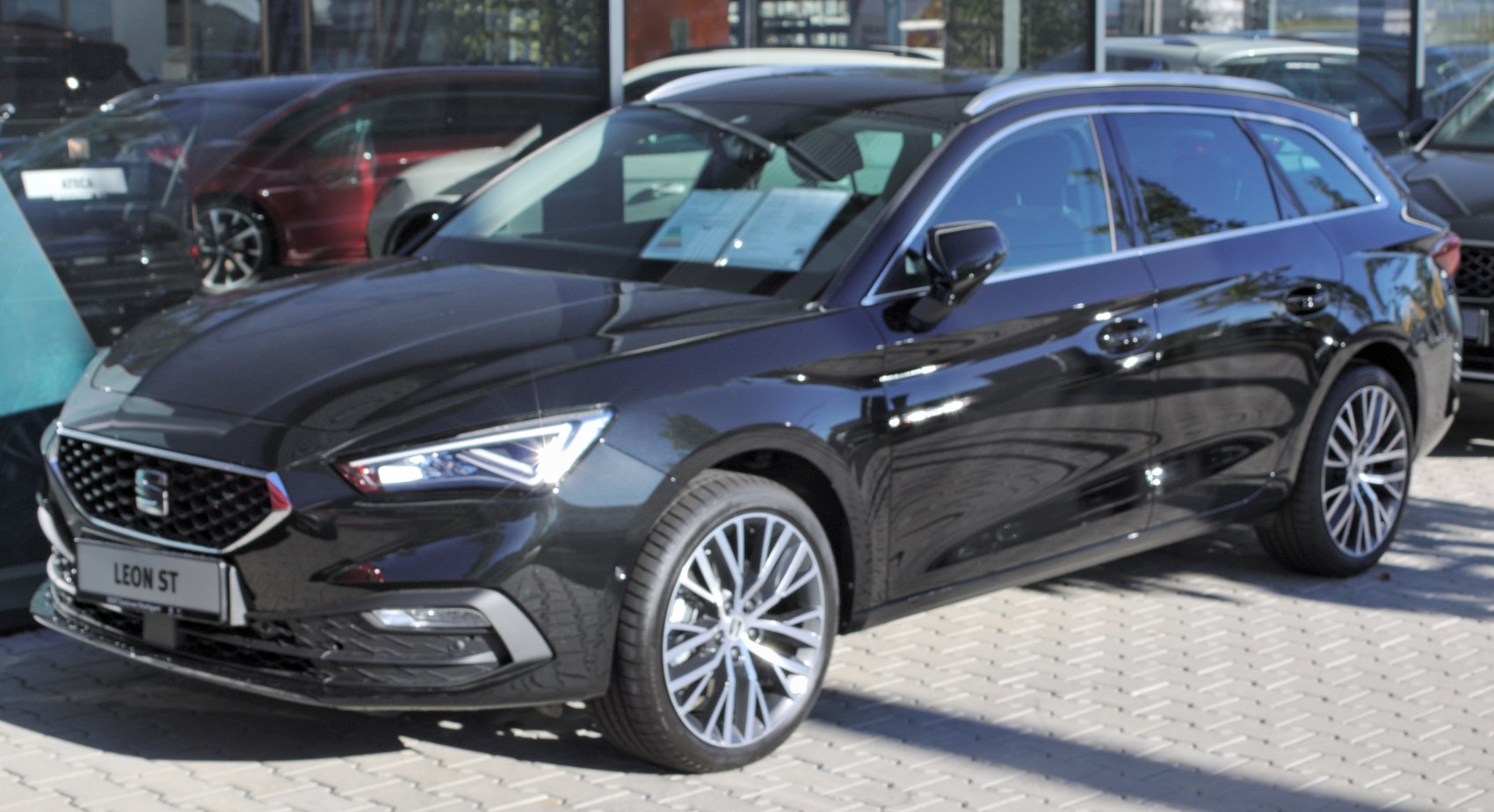 Black modern wagon with LED headlights and alloy wheels