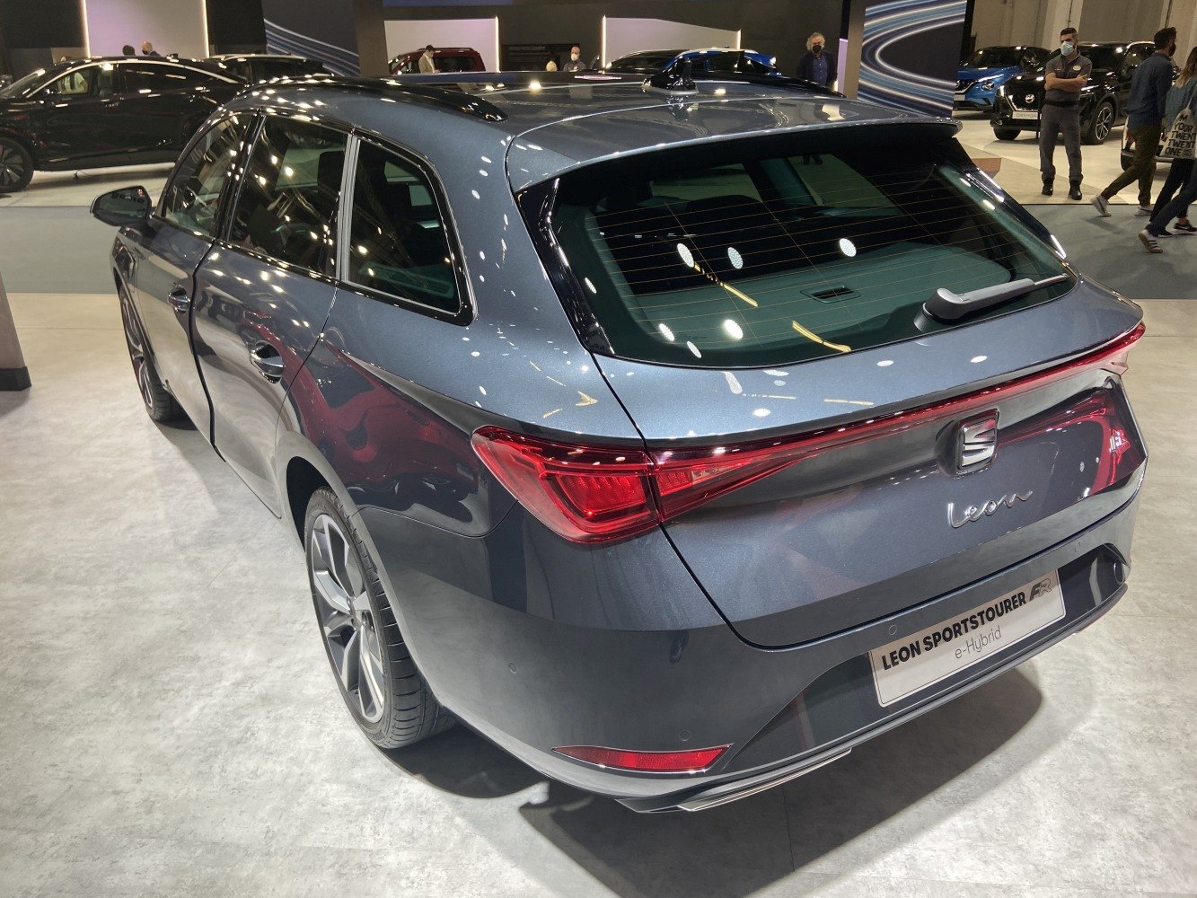 Rear view of a modern hybrid wagon with LED tail lights and sleek design