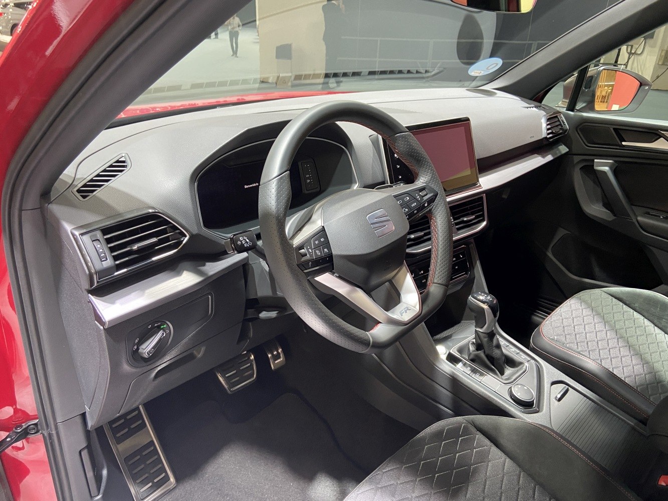 Modern steering wheel and digital dashboard with center console