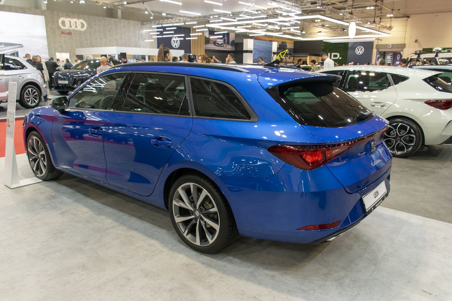 Rear and side view of modern station wagon with alloy wheels and tinted windows
