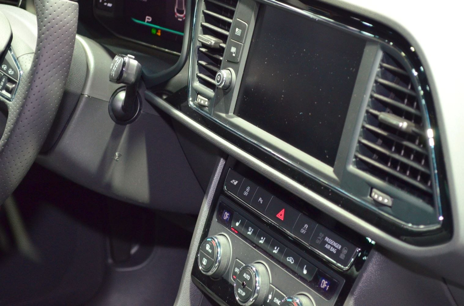 Dashboard and climate control panel with infotainment screen