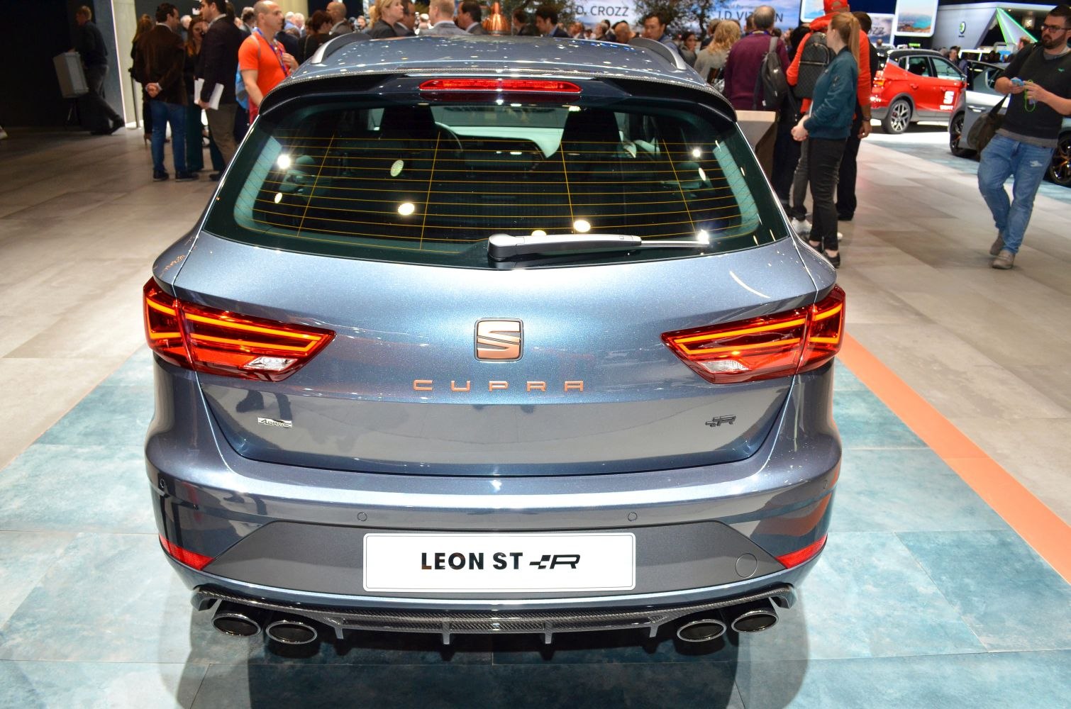 Sporty hatchback rear with LED lights and quad exhausts