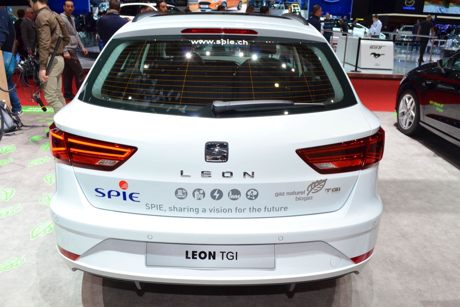 Modern hatchback rear with LED taillights and rear wiper.