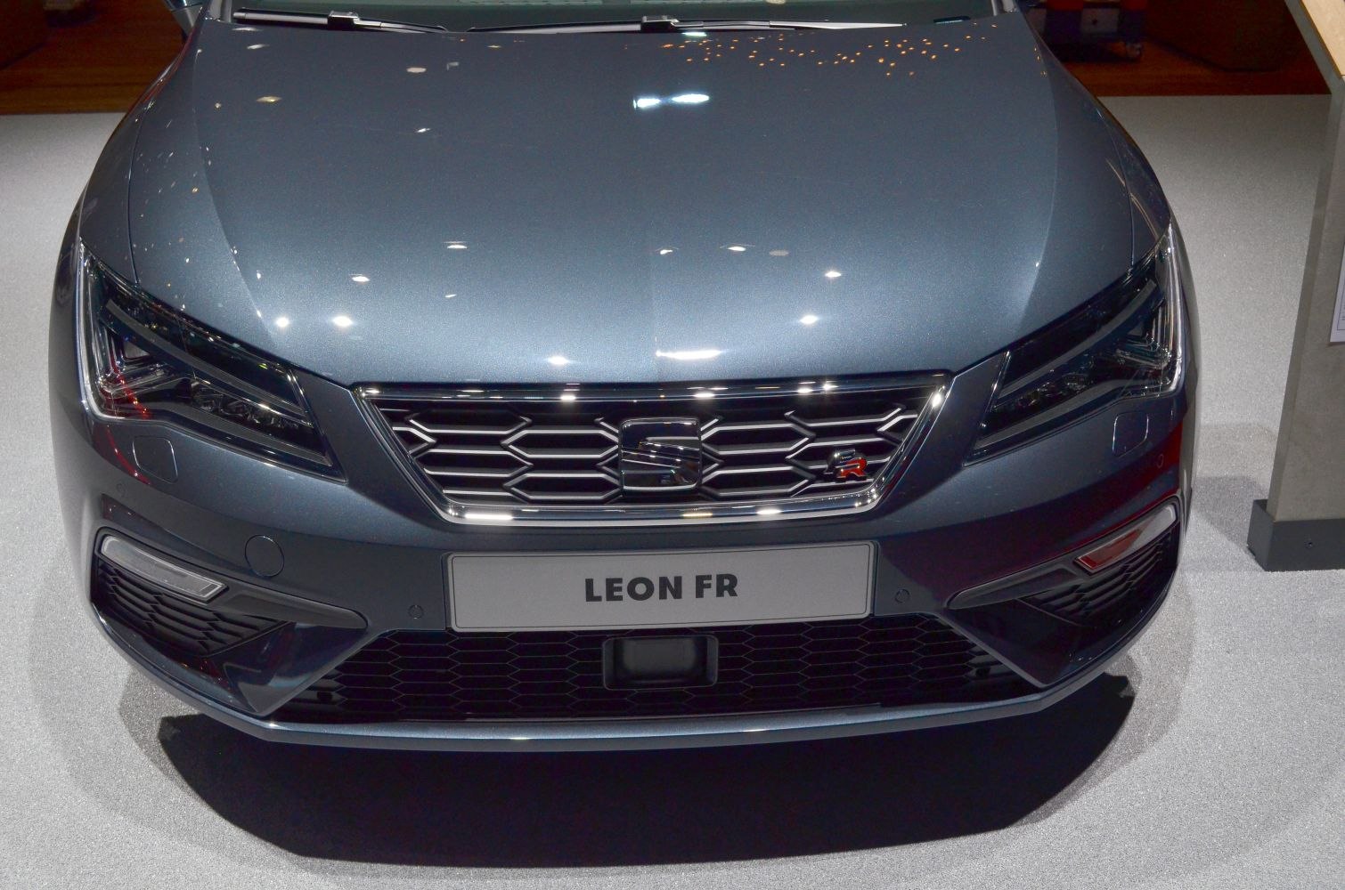 Front grille and sharp LED headlights design