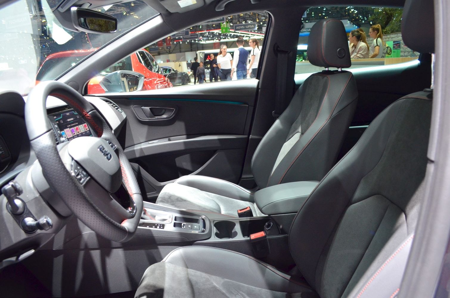 Driver and passenger front seats with dashboard and steering wheel