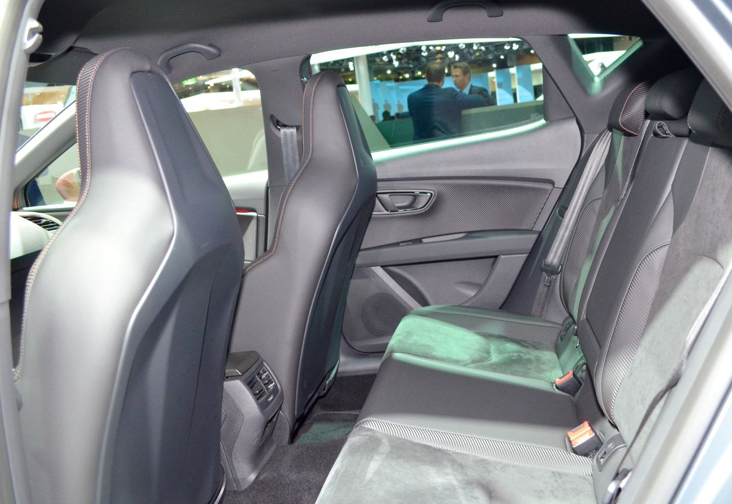 Rear interior with sports seats, door panel trim, and rear ventilation