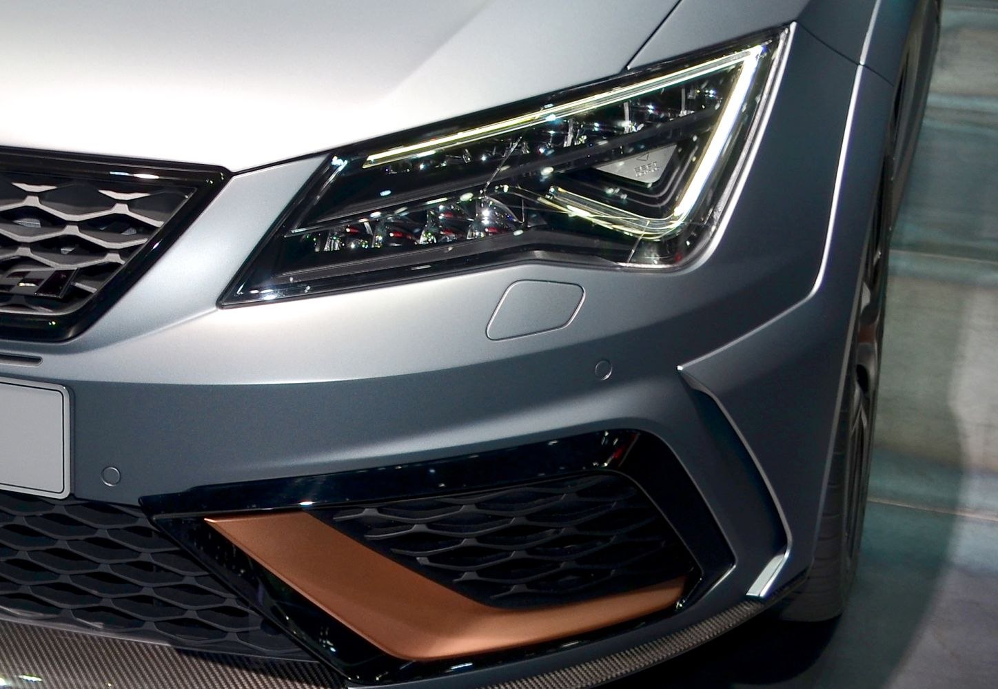 Sharp LED headlight and sporty front grille design
