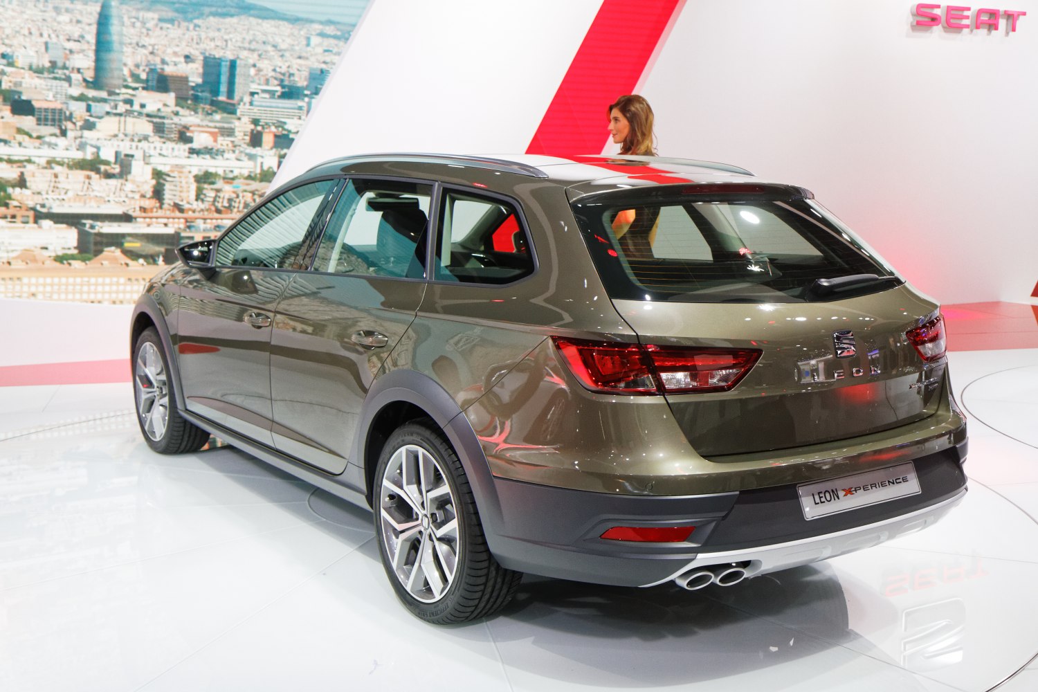 Rear view with dual exhaust and rugged crossover design