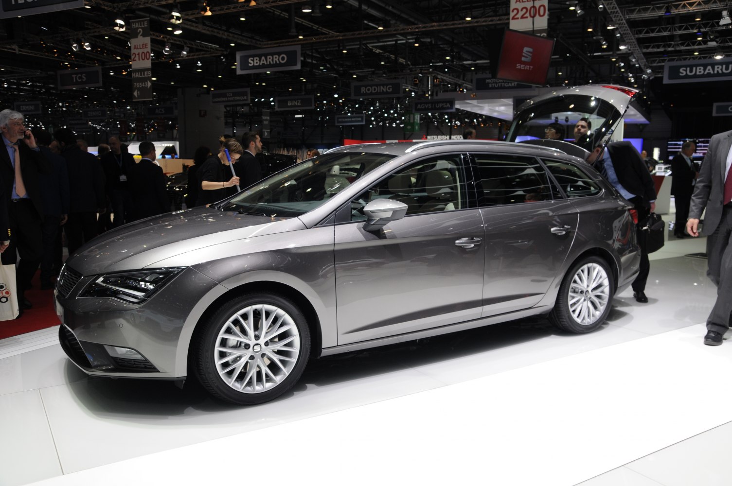 Metallic gray station wagon with sleek alloy wheels and aerodynamic design