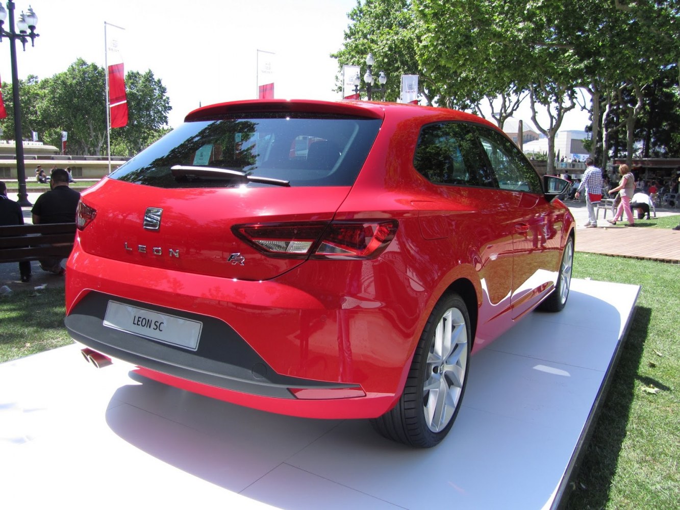 Rear hatchback design with sporty taillights and alloy wheels
