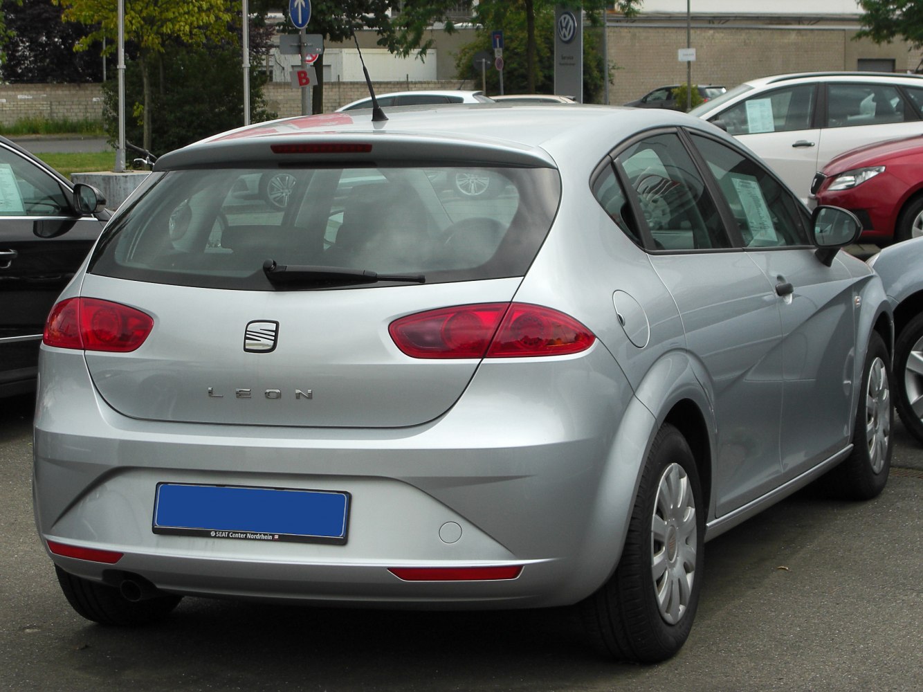 Rear hatchback view with distinctive tail lights and rear design