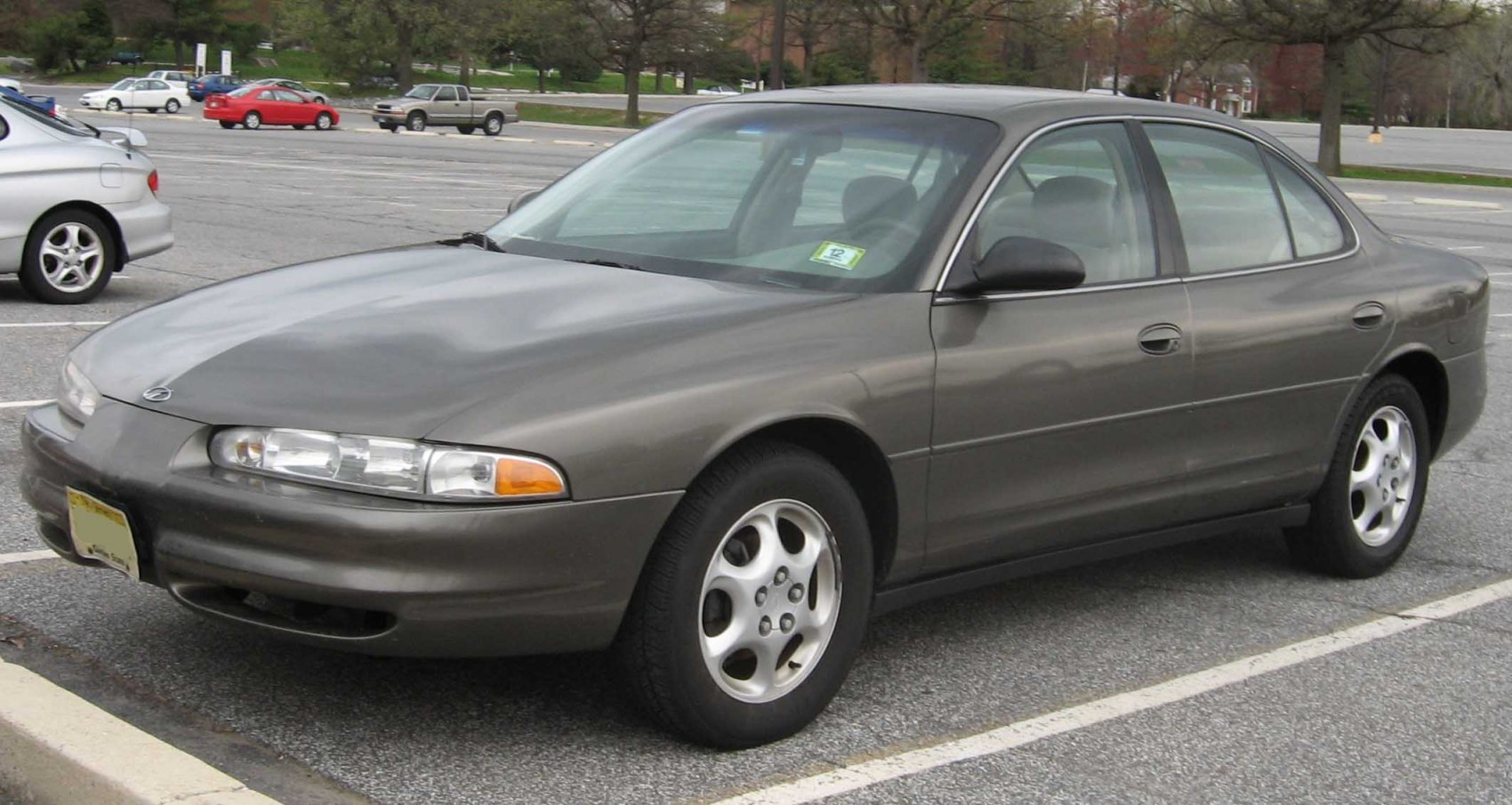 Front side view of a mid-size sedan with alloy wheels