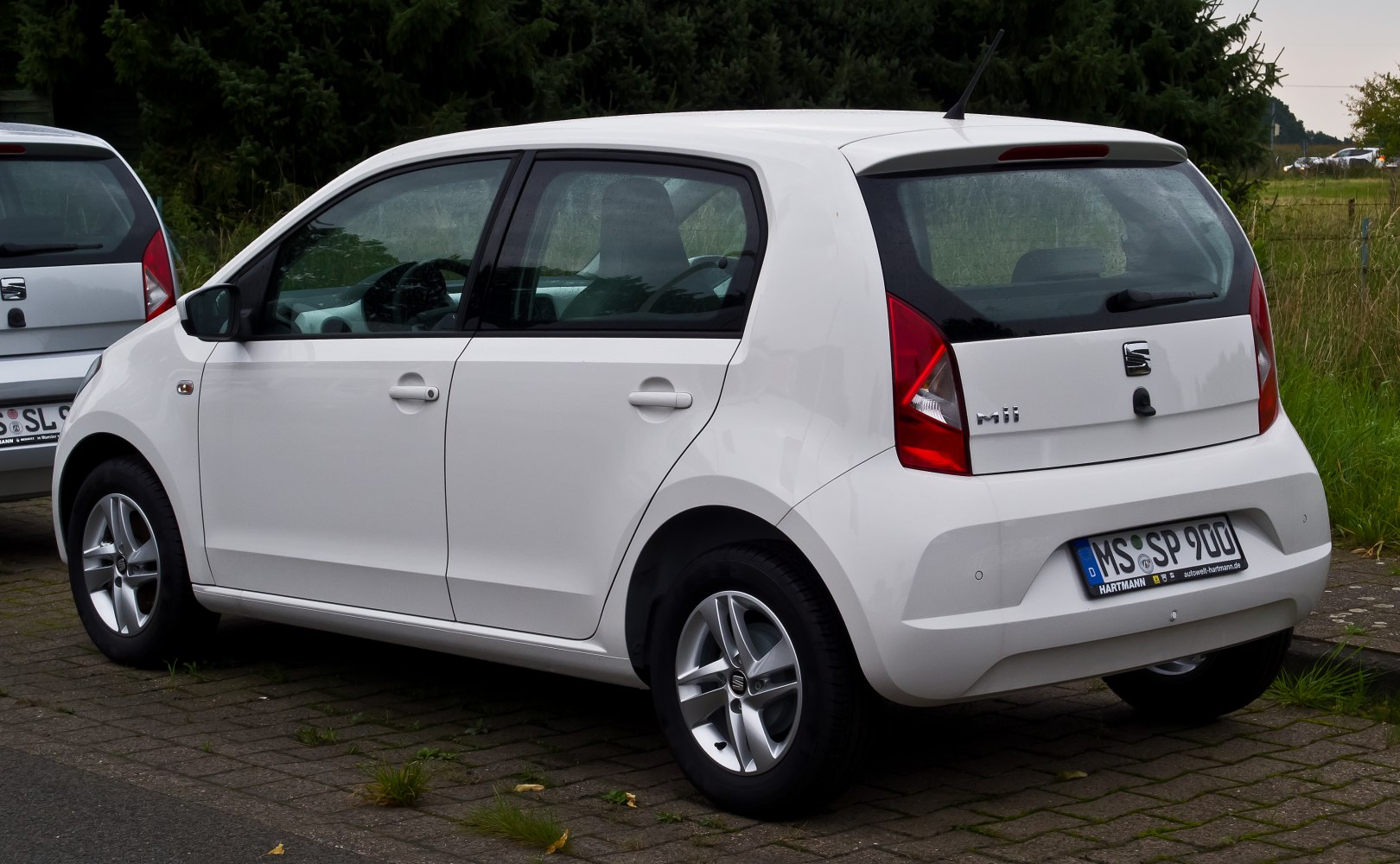 Rear-side view of compact five-door hatchback with alloy wheels
