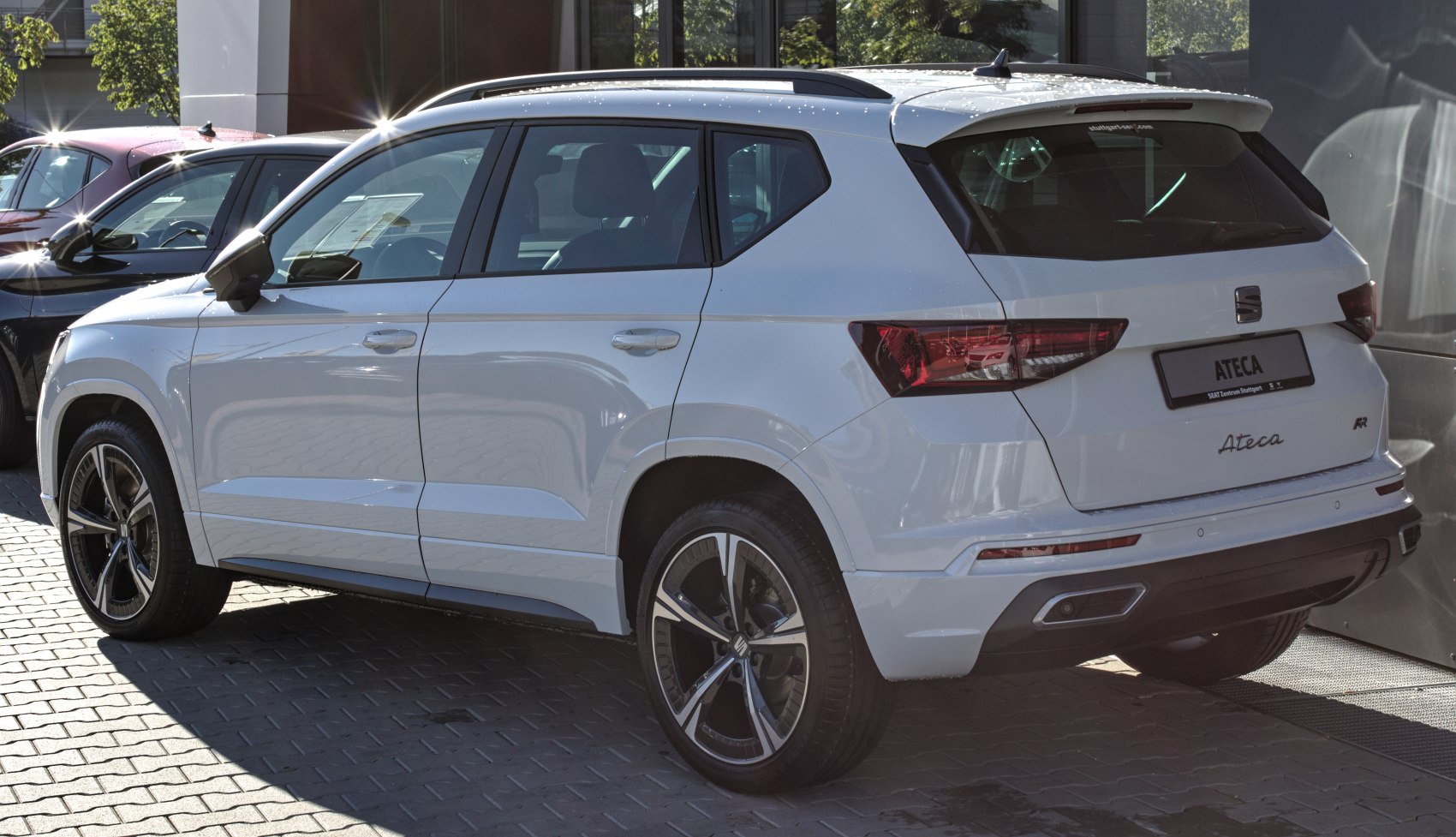 Rear side view with stylish alloy wheels of a modern compact SUV