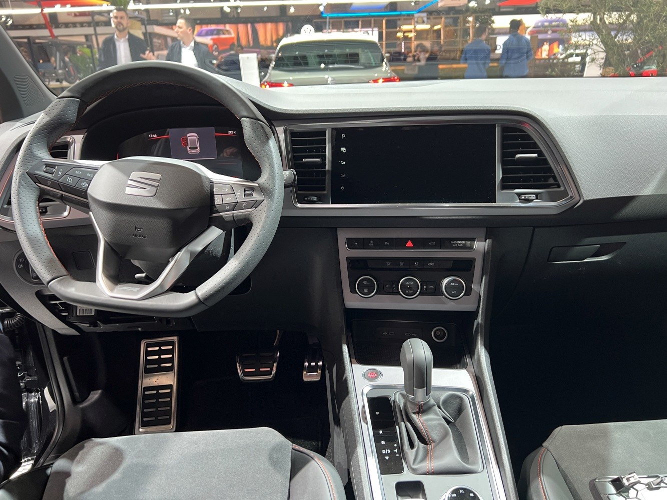 Car interior dashboard with multifunction steering wheel and automatic gear shift