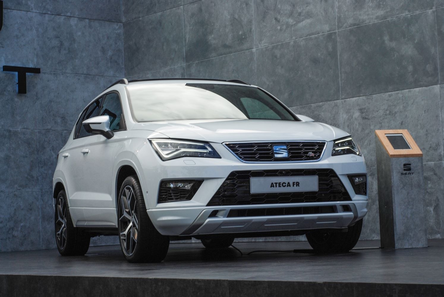 Sporty SUV front with LED headlights and aggressive grille