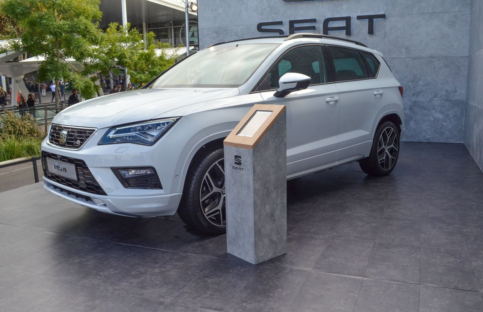 Front-side view of a compact SUV with LED headlights and alloy wheels