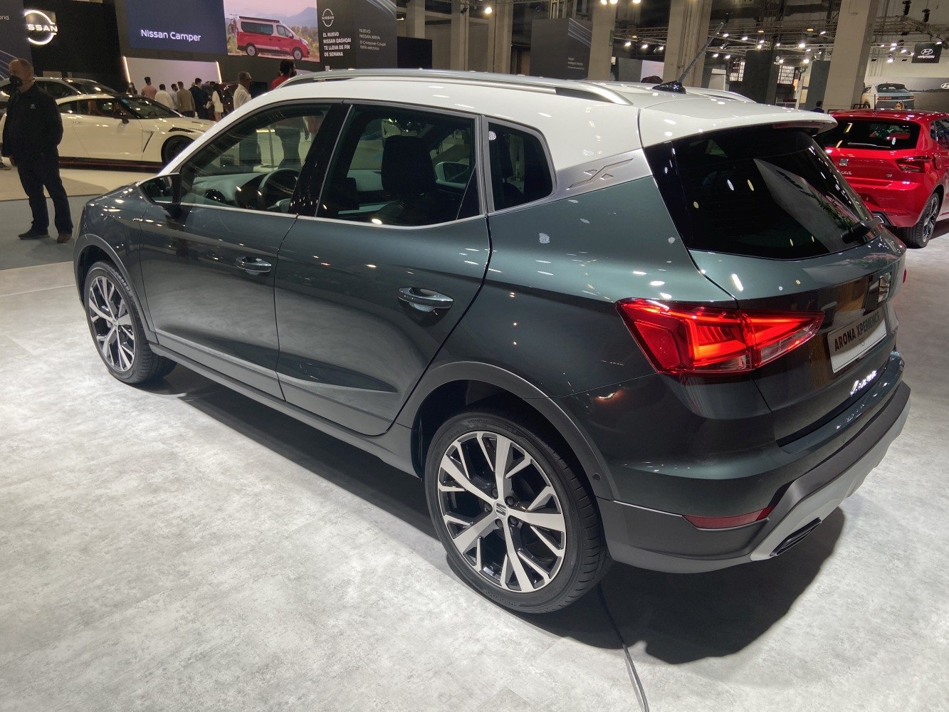 Rear 3/4 view with two-tone roof and alloy wheels