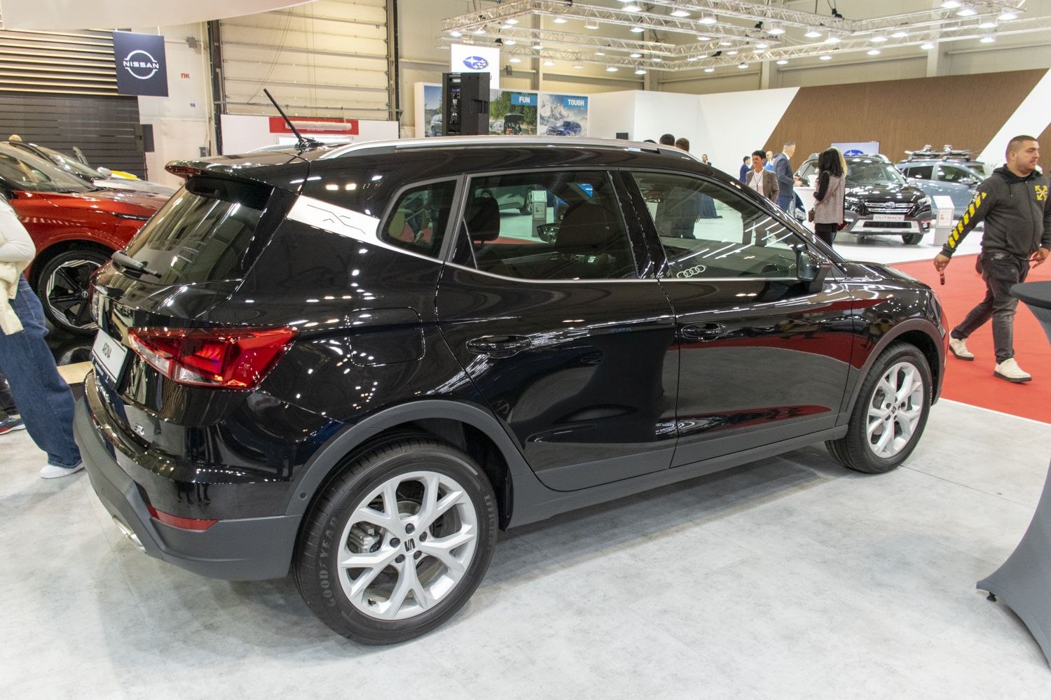 Black SUV rear side with silver roof rails and modern taillights