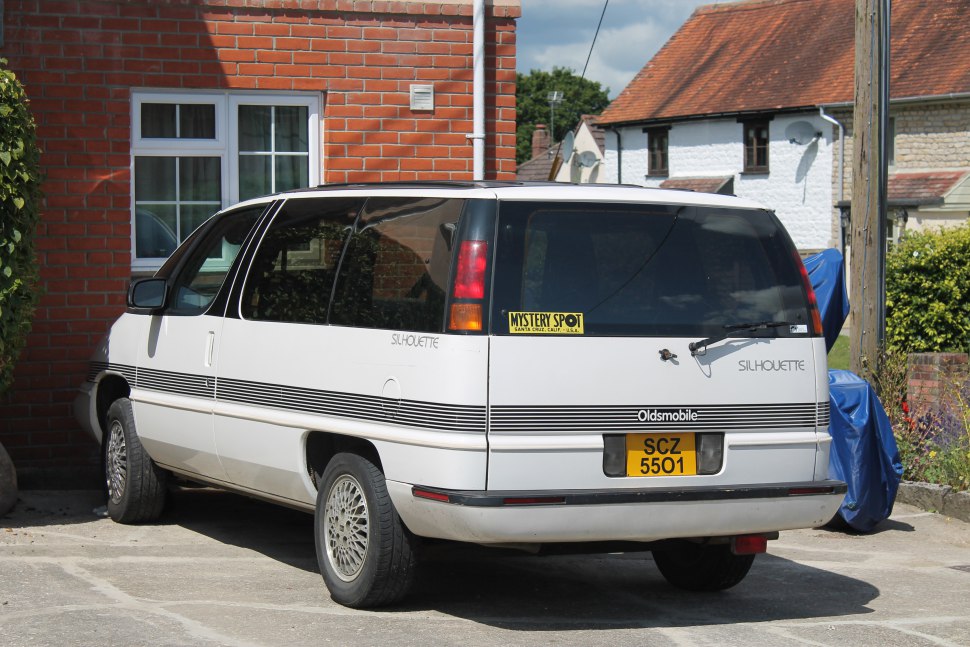 Retro minivan rear view with taillights and black stripe detailing