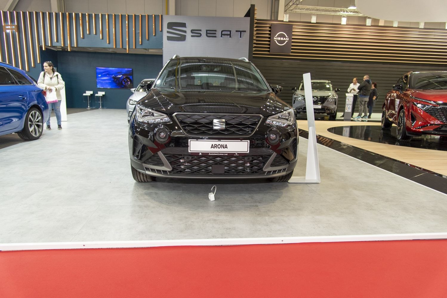 Front view of a modern SUV with distinctive grille and LED headlights
