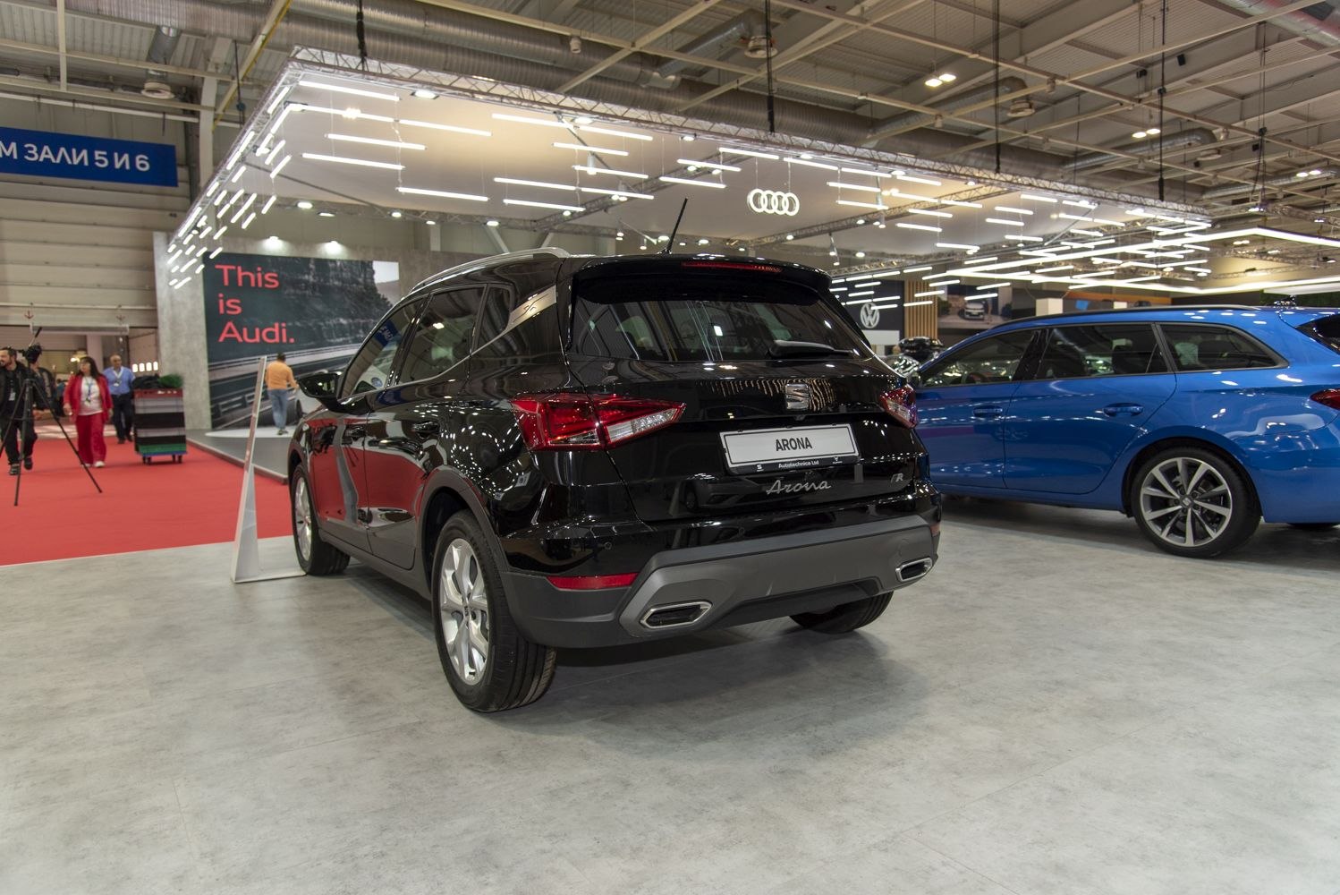 Rear view of compact SUV with modern tail lights and dual exhaust