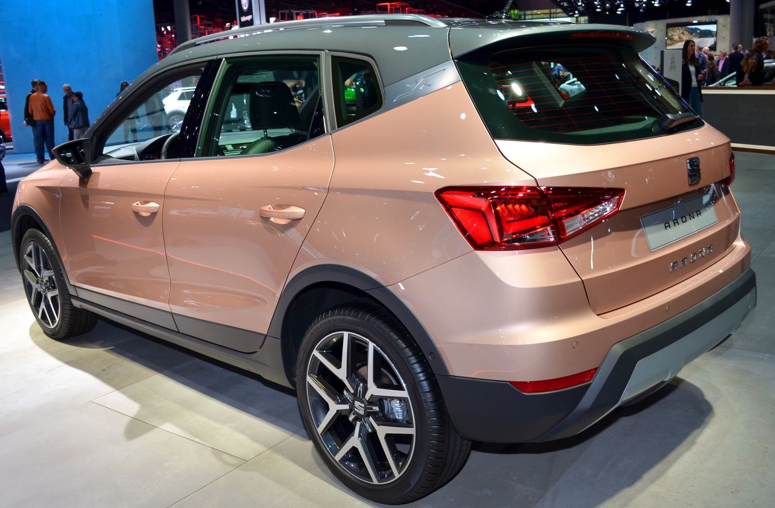Rear side view with modern alloy wheels and rear lights of compact SUV