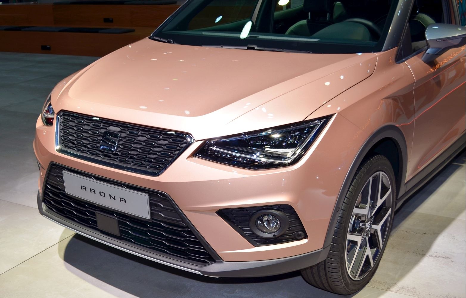 Front LED headlights and alloy wheel on a compact SUV